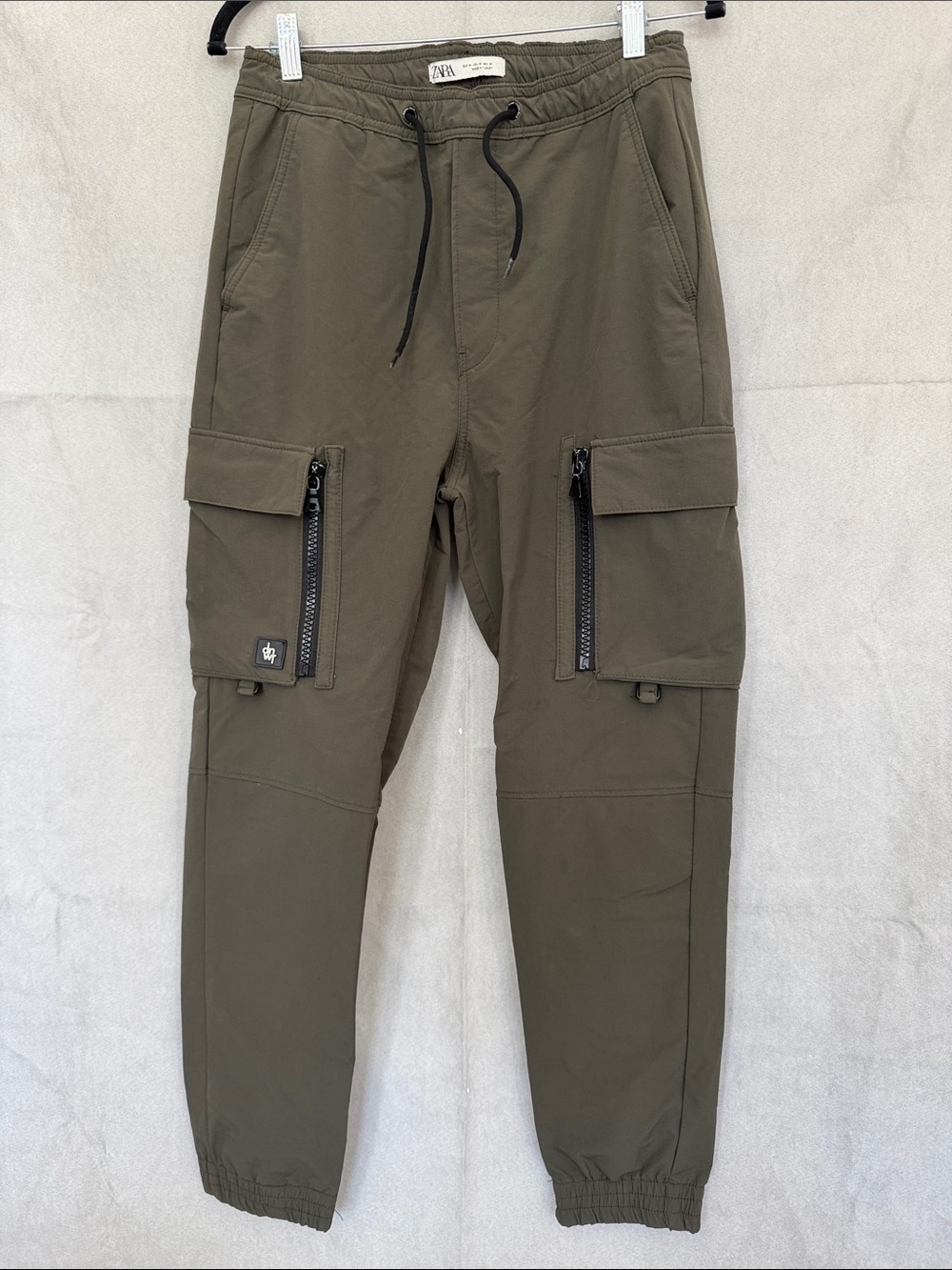 Zara Olive Green Cargo Joggers with Zip Pockets.